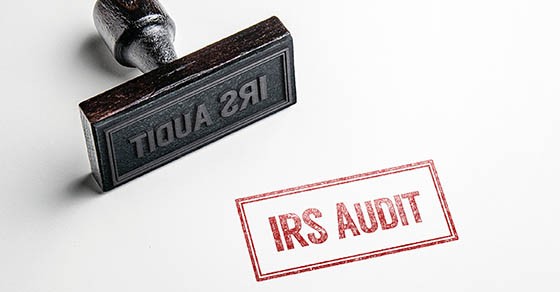 Rubber,Stamping,That,Says,’irs,Audit’.